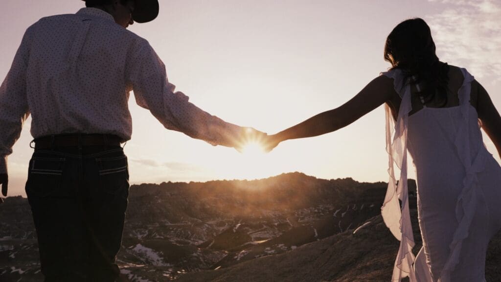 A couple out in Badlands National Park with Nathaniel Wilson Video before their wedding in Wyoming