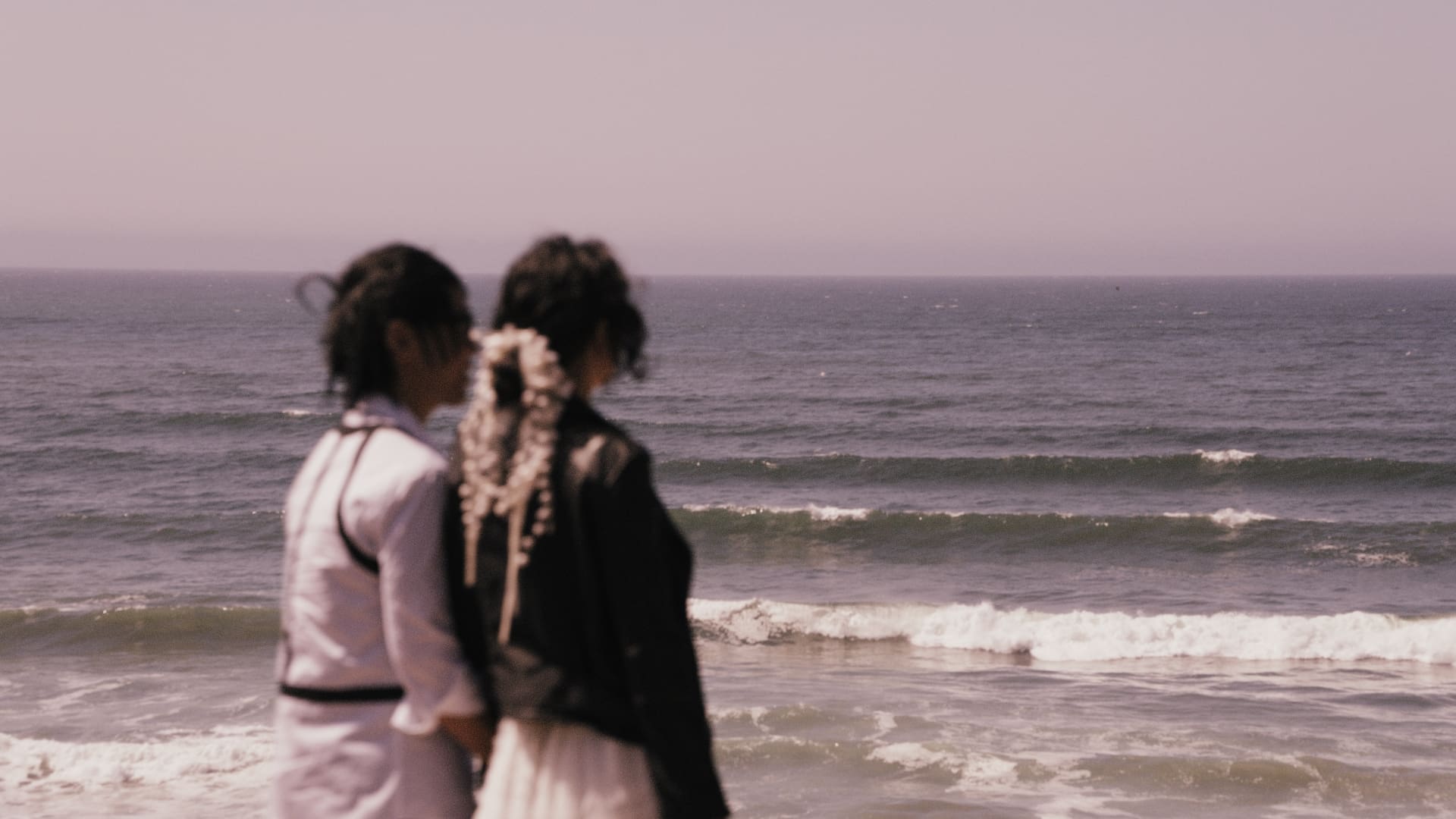 A couple at a beach in central California who hired Nathaniel Wilson Video as their elopement videographer
